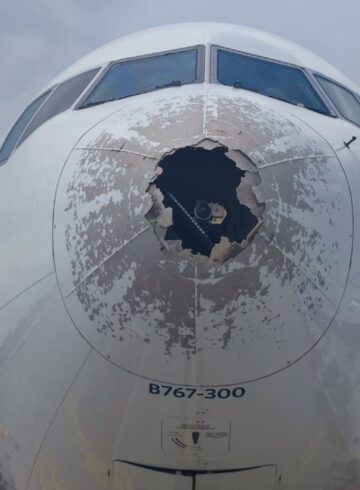 the front of a plane with a hole in it