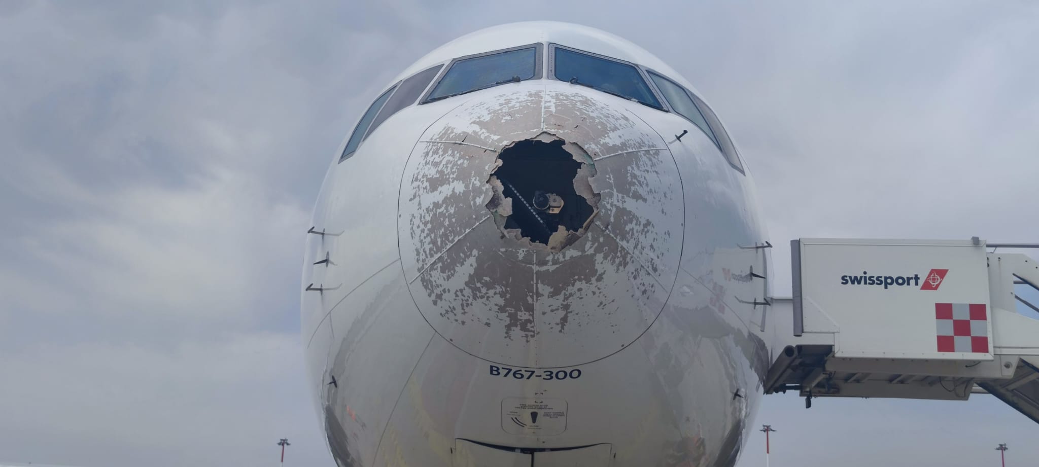 the front of a plane with a hole in it