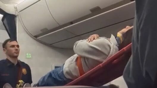 a person lying on a chair