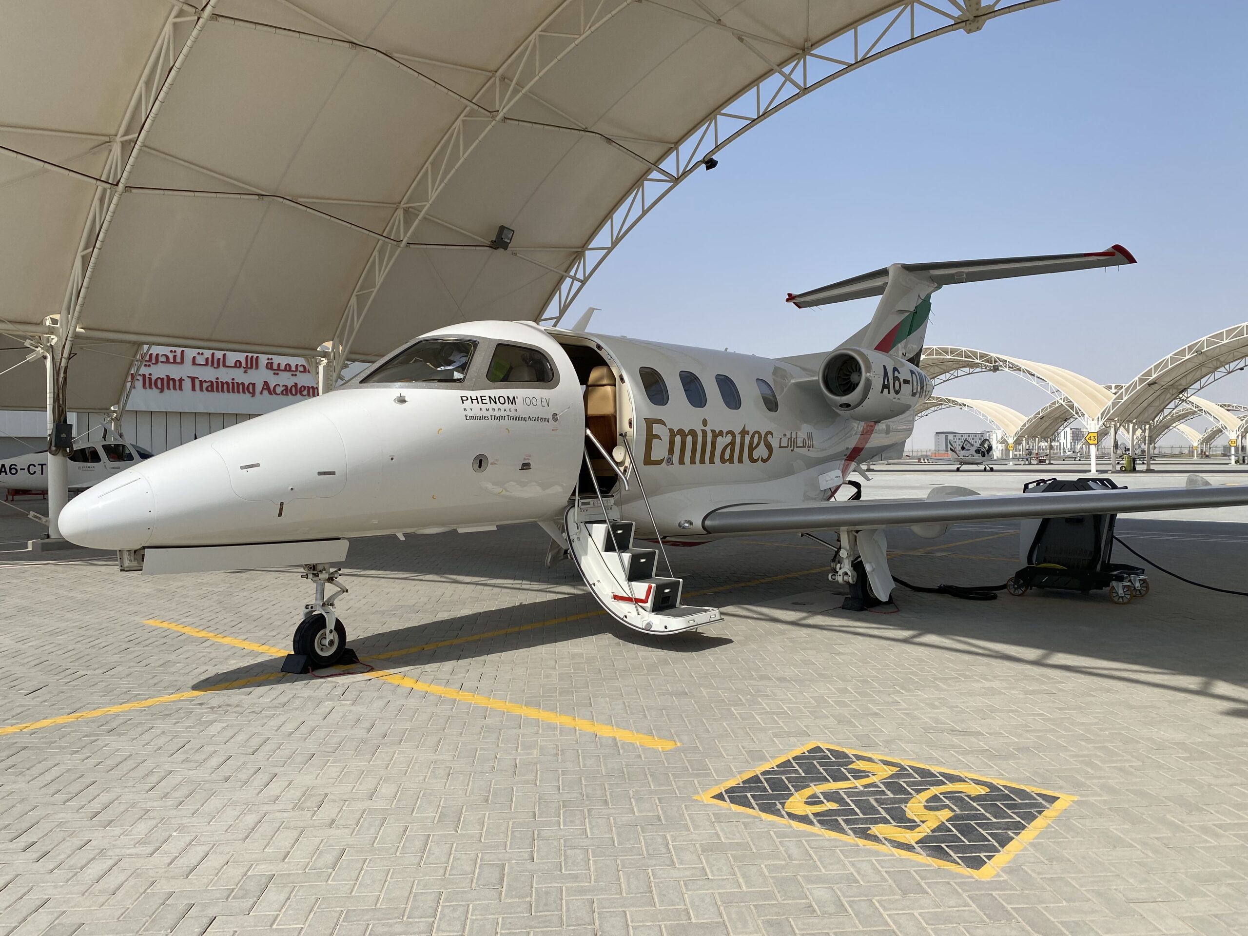 Emirates Embraer Phenom 100 EV Jet
