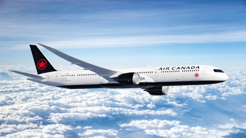 a plane flying above the clouds