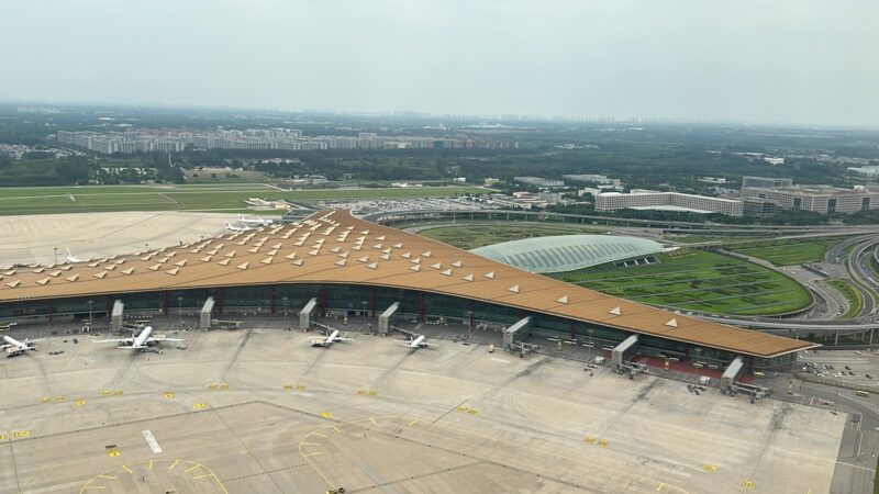 an airport with planes in the air