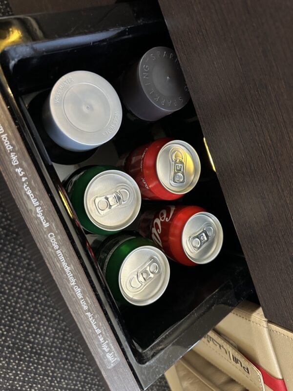a group of cans in a drawer
