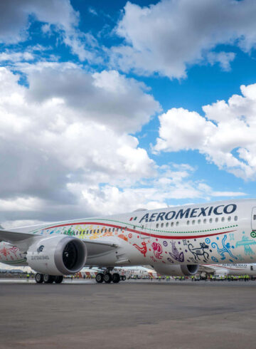 a large airplane with colorful designs on it