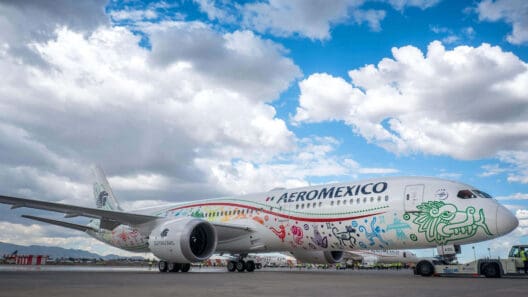 a large airplane with colorful designs on it