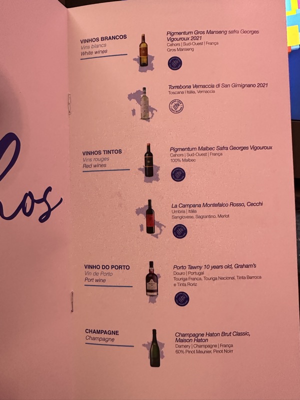 a menu with bottles of wine