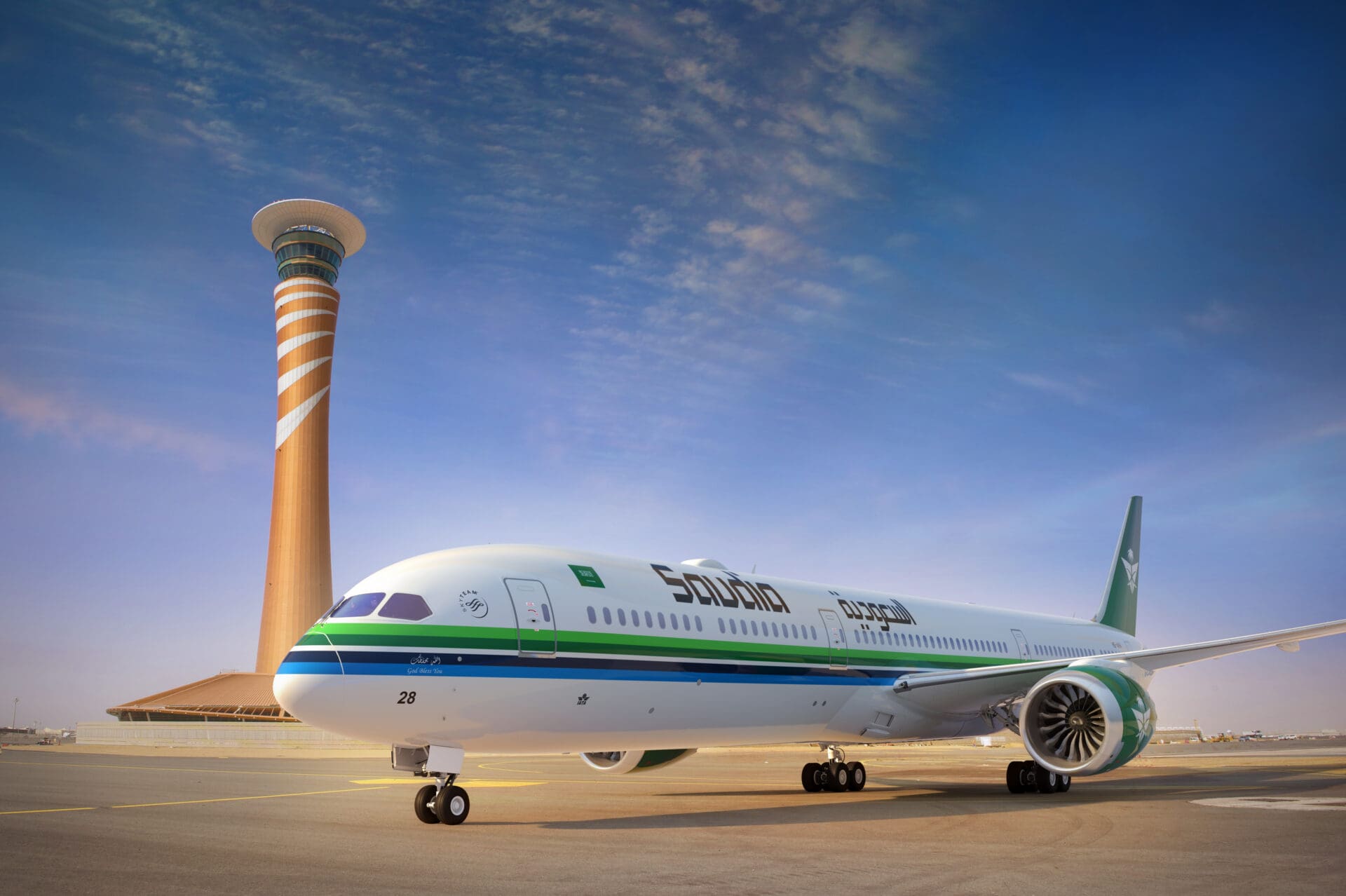 a white airplane on a runway