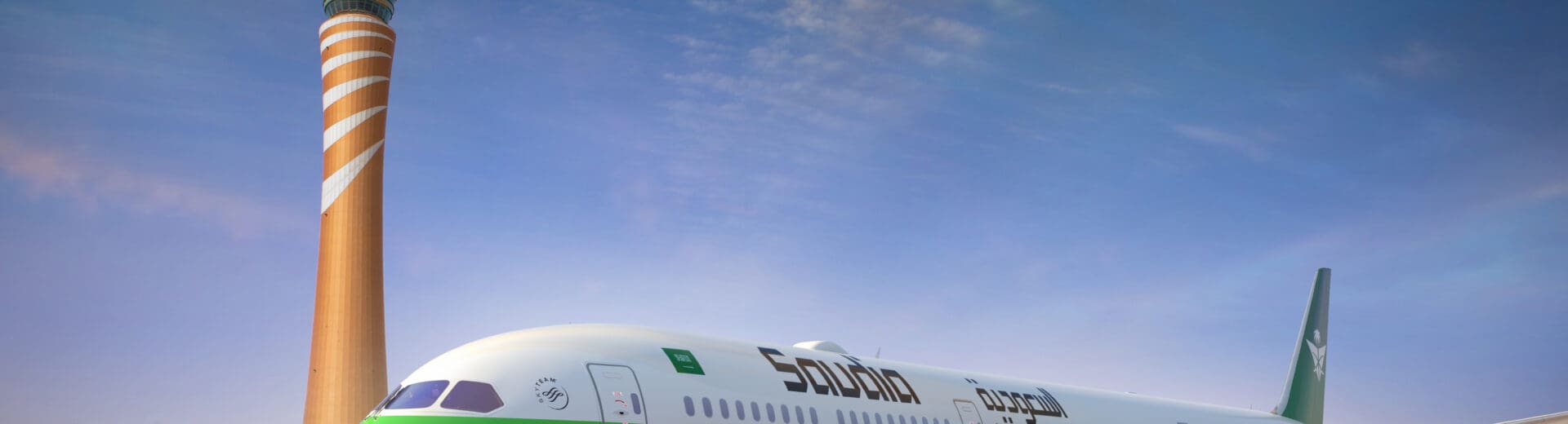 a white airplane on a runway