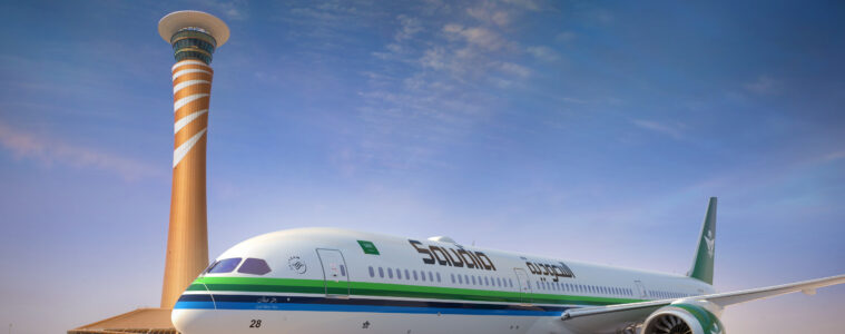 a white airplane on a runway