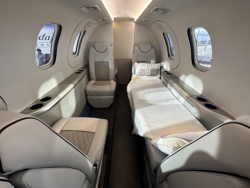 a white and black interior of an airplane