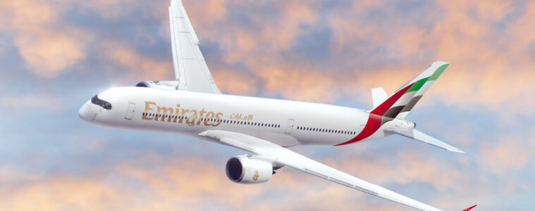 a white airplane flying in the sky