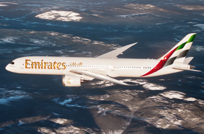 a plane flying over the ocean