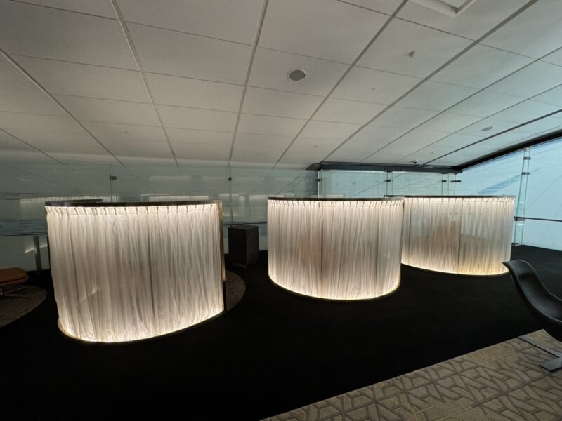 a group of white lights in a room