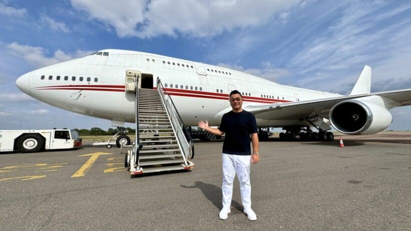 a man standing in front of a plane