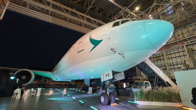 a white airplane in a hangar