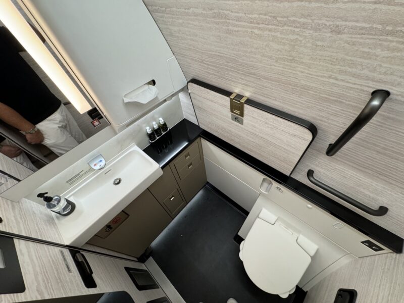 a bathroom with a sink and toilet