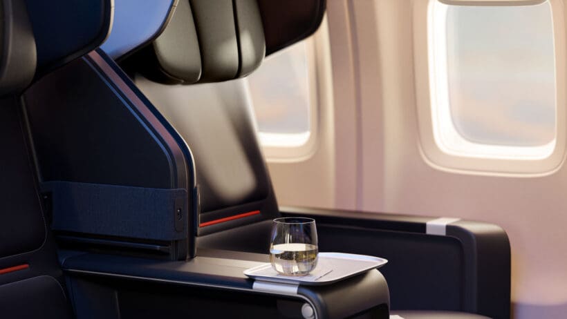 a glass on a tray in a plane