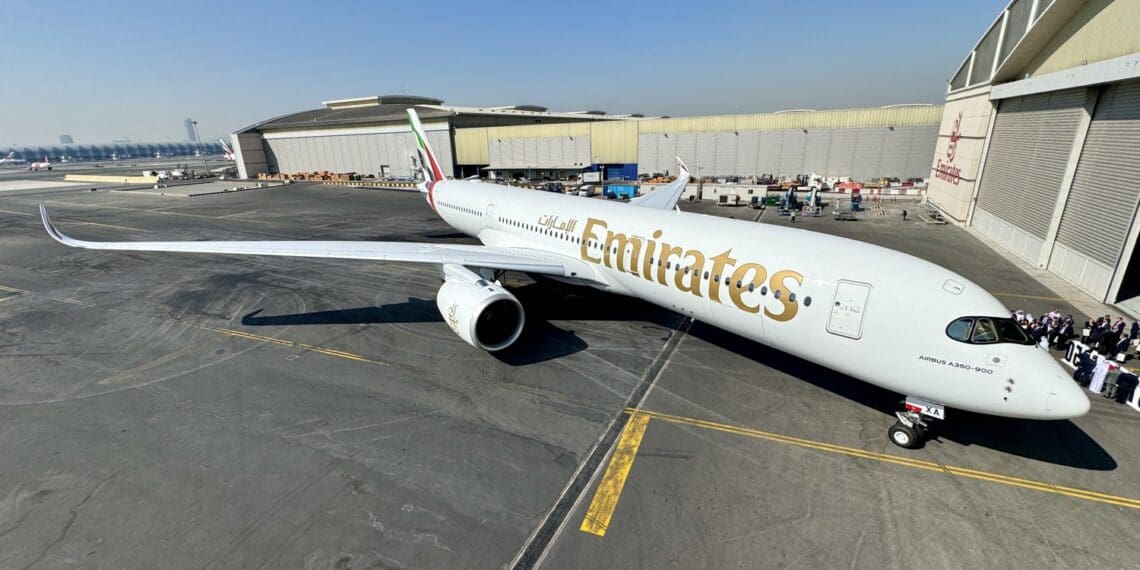a large white airplane on a tarmac
