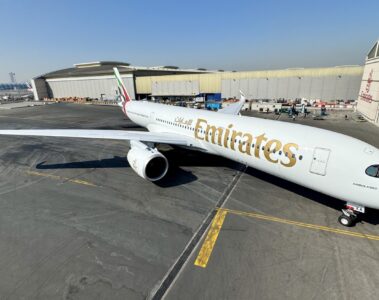 a large white airplane on a tarmac