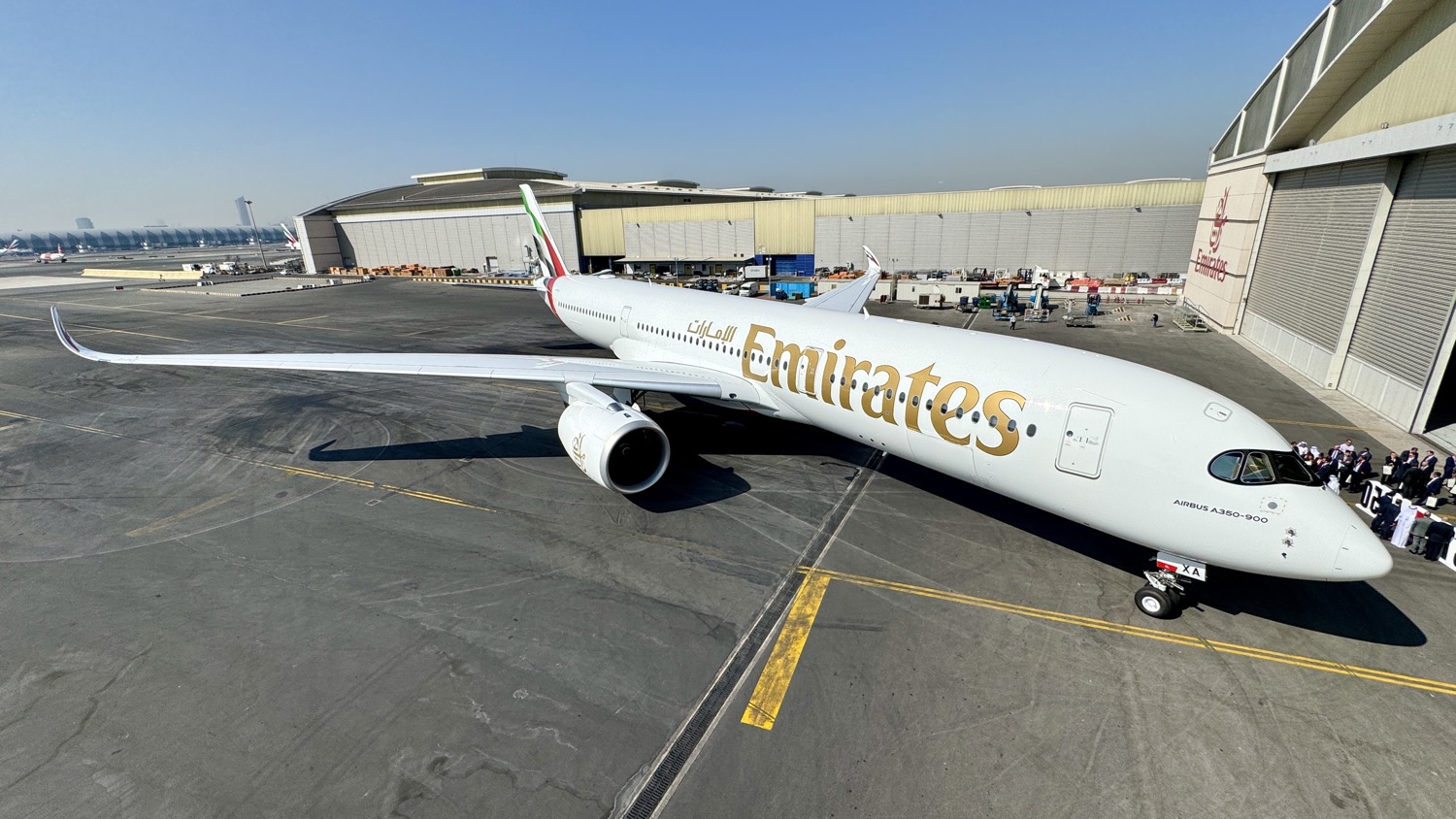 a large white airplane on a tarmac