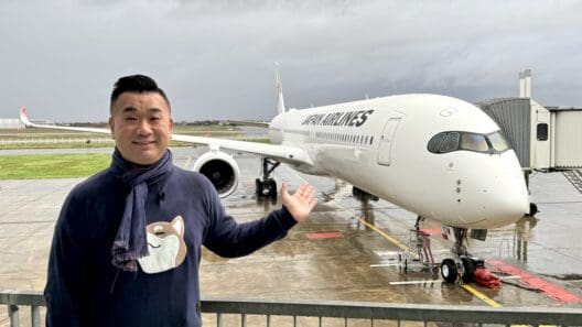 a man standing in front of a plane