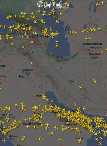 a map of the world with yellow airplanes