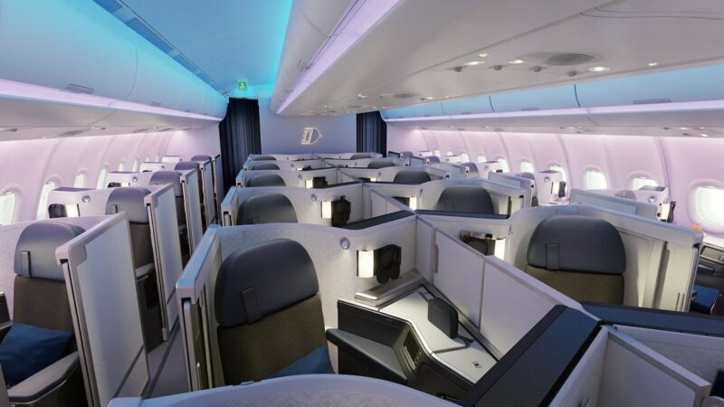 a cabin of an airplane with rows of seats