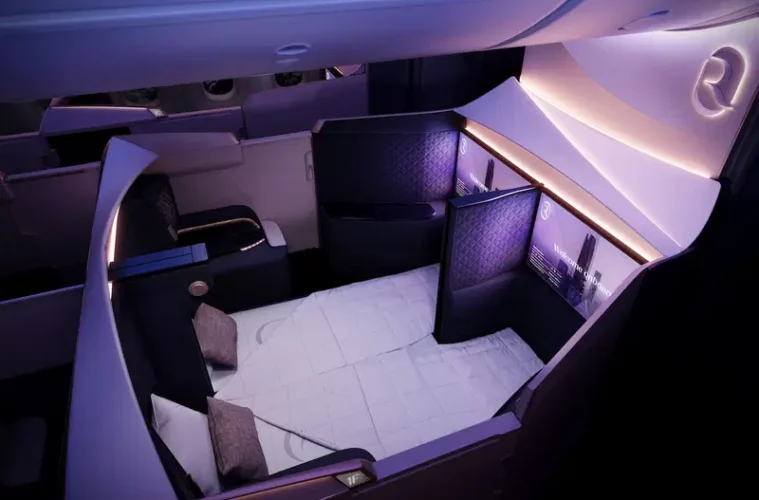 a room with a bed and a tv
