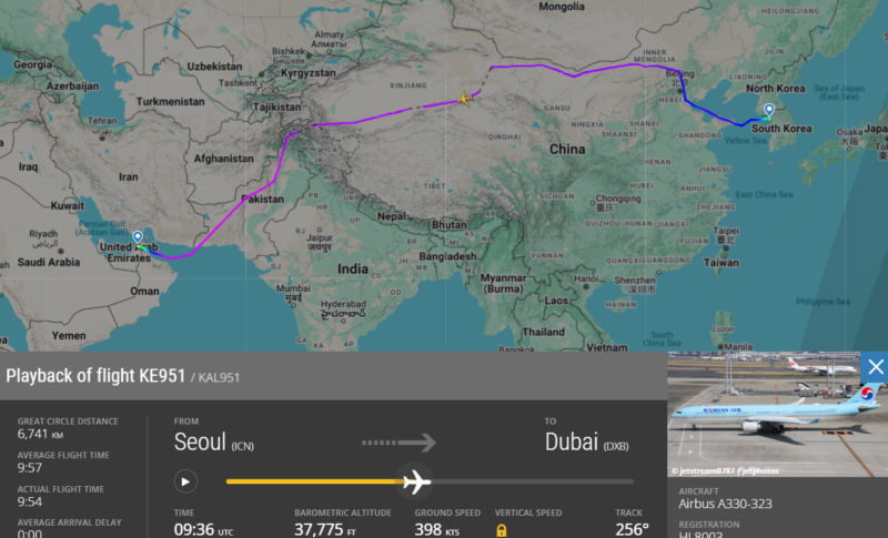a map of the world with a plane and a route