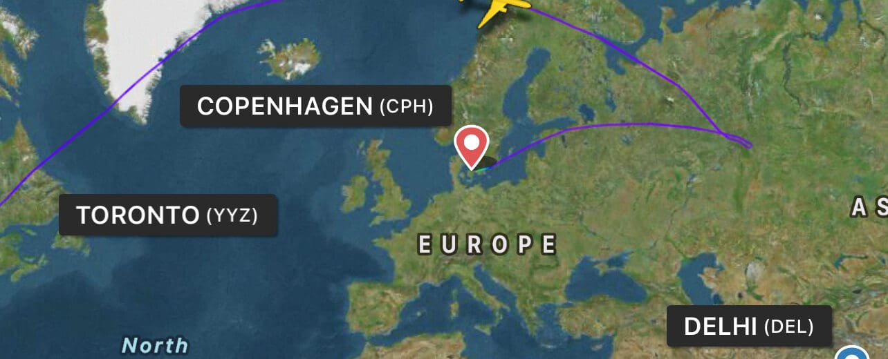 a map of the world with a plane flying