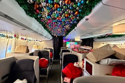 a room with christmas decorations and a ceiling