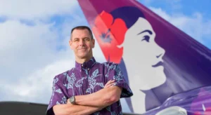 a man standing in front of a plane