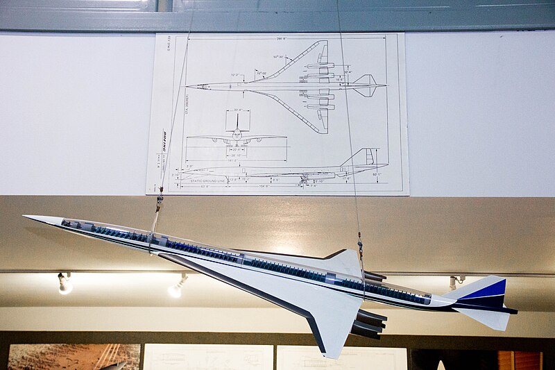 a model airplane from a white board