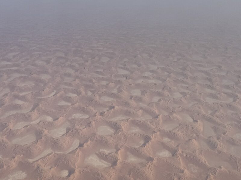 a sand dunes with ripples