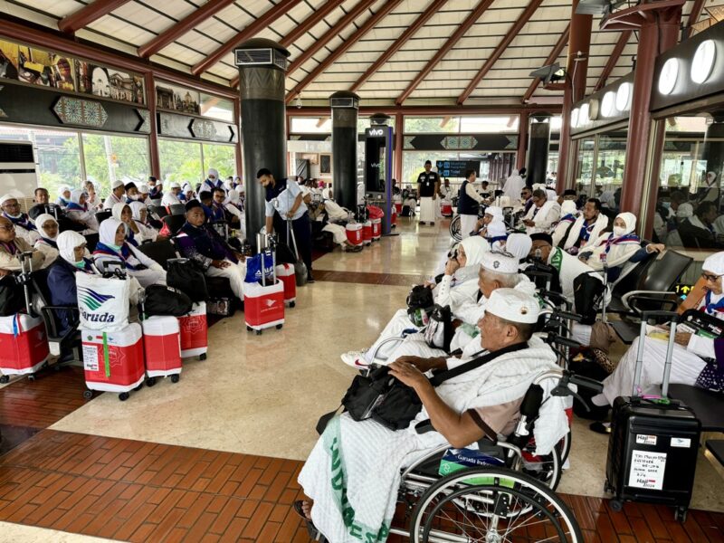 a group of people in wheelchairs in a room