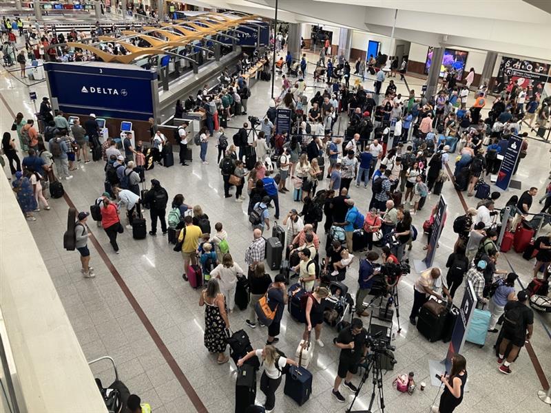 a group of people in a terminal