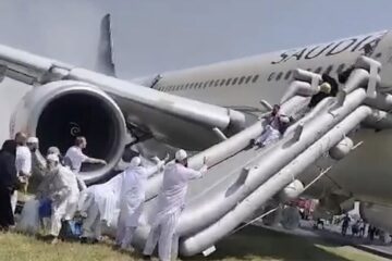 a group of people climbing a plane