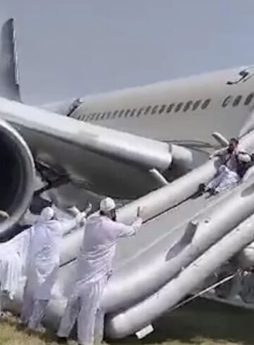 a group of people climbing a plane