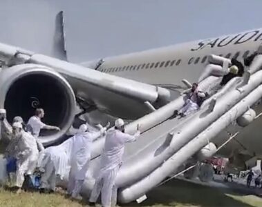 a group of people climbing a plane