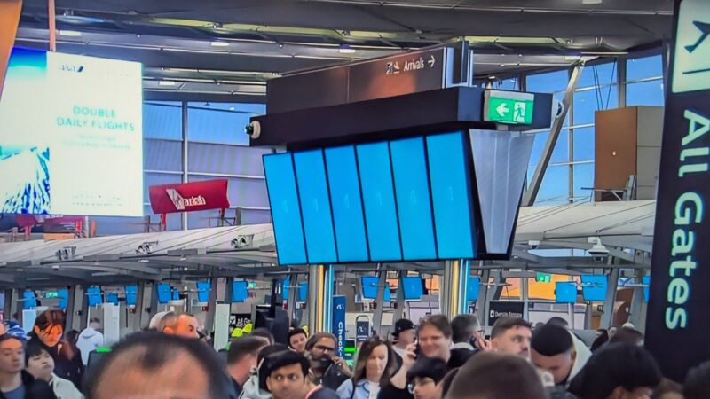 a group of people in a terminal