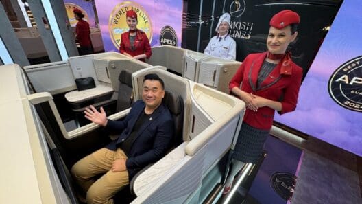 a man and woman in a chair