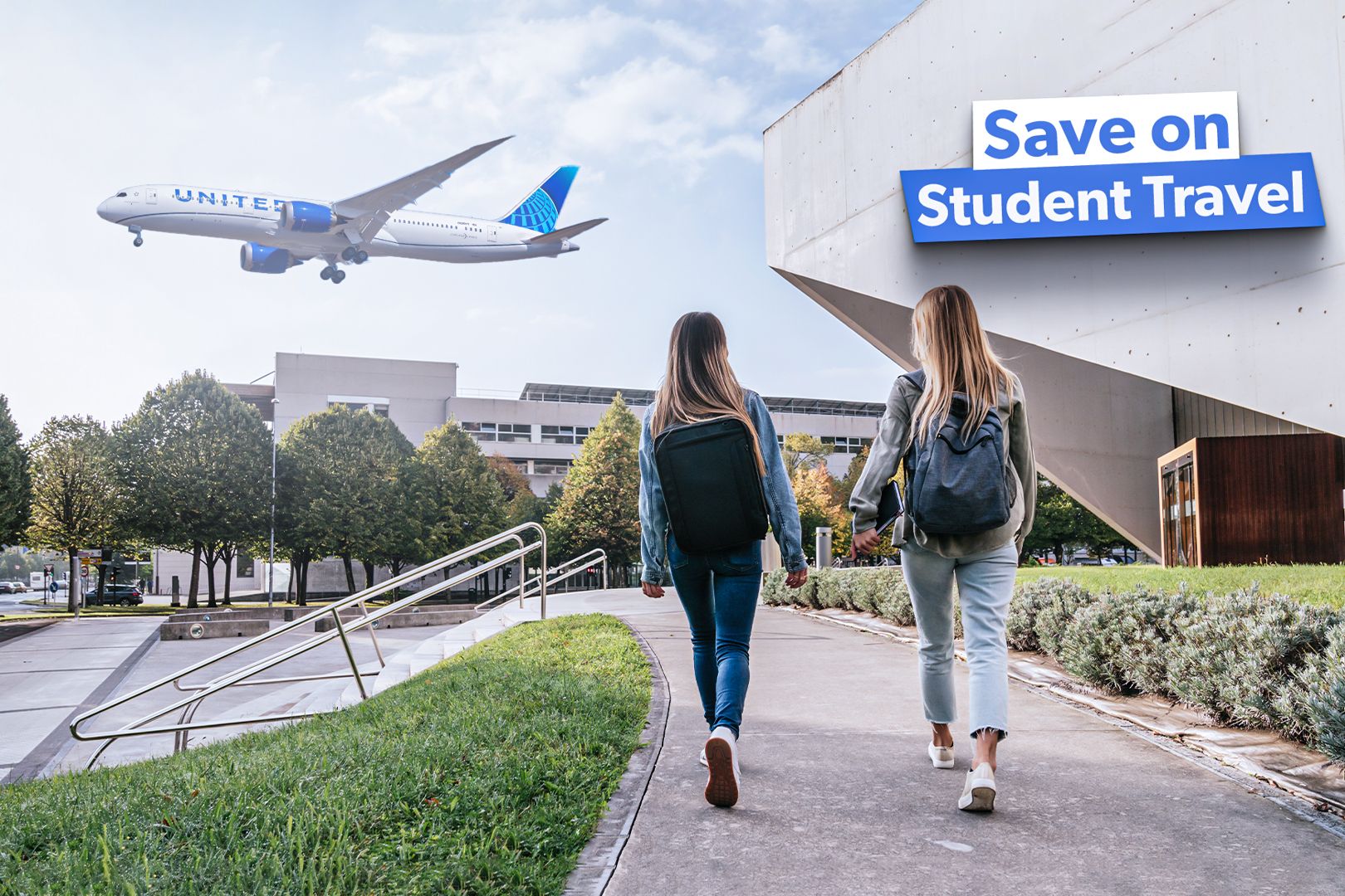 two women walking on a sidewalk with a plane flying in the sky