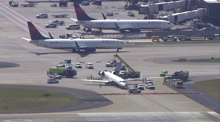 a group of airplanes on a runway