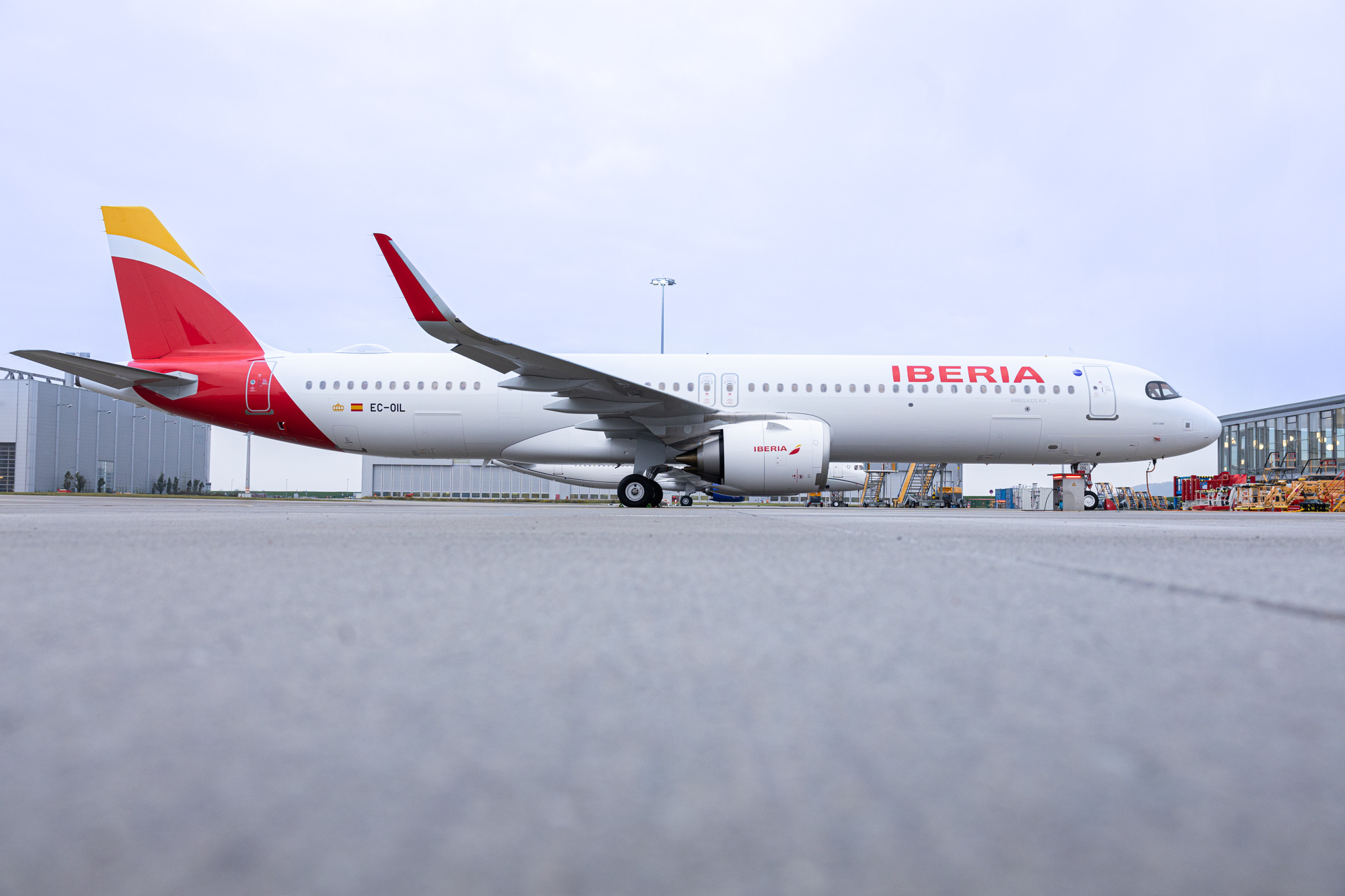 a large white airplane on a runway