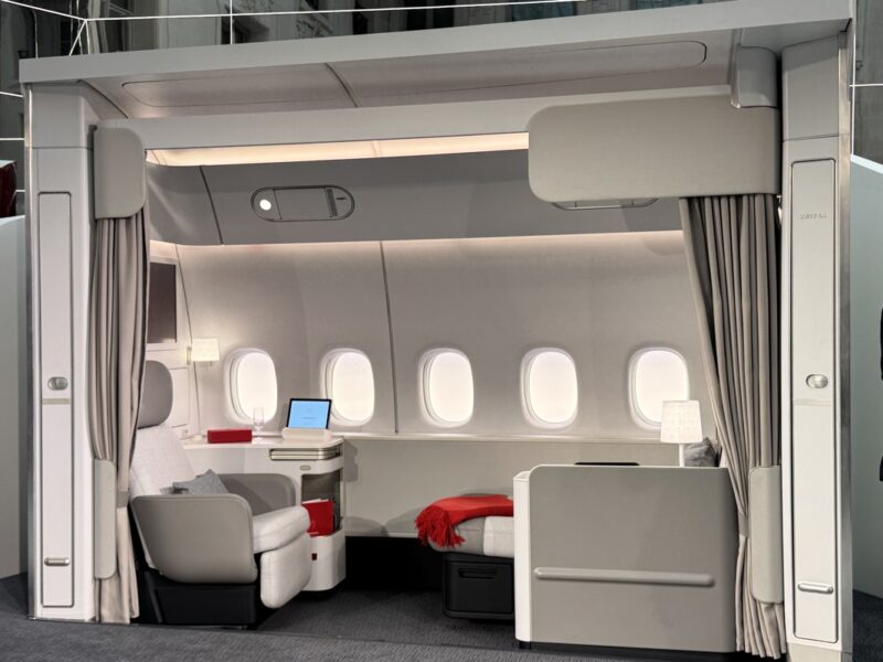 a plane with windows and a bed