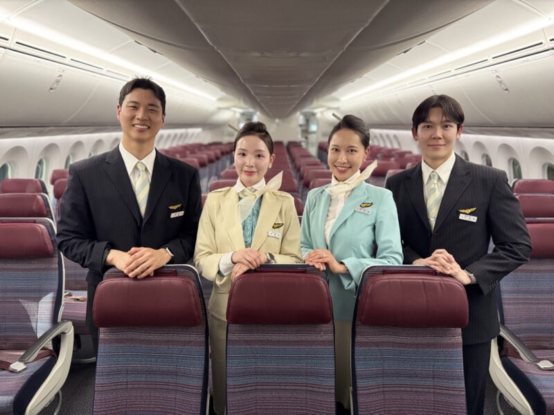 a group of people standing in a plane