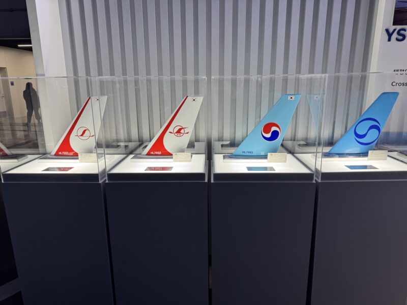 a group of airplanes in display cases