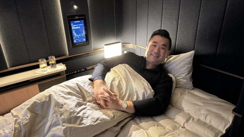 a man lying on a bed