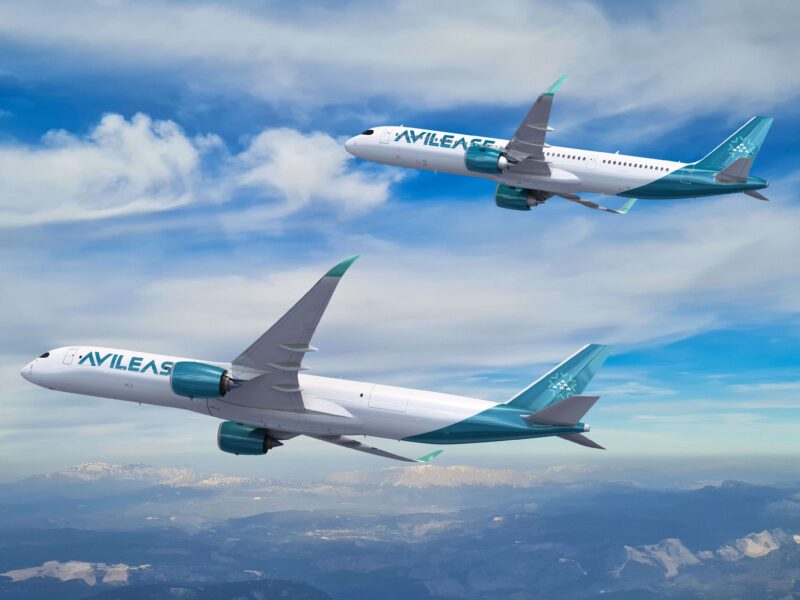 two airplanes flying in the sky