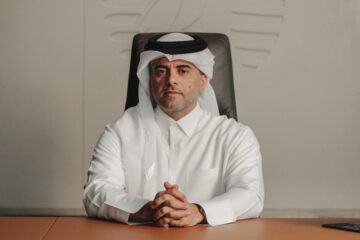 a man sitting at a desk